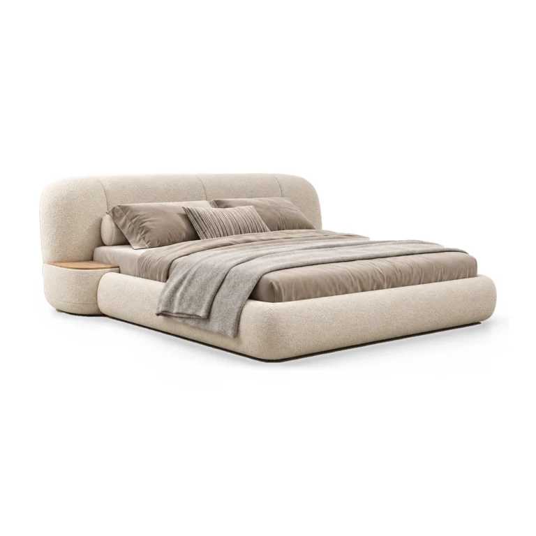 Upholstered bed on a white background